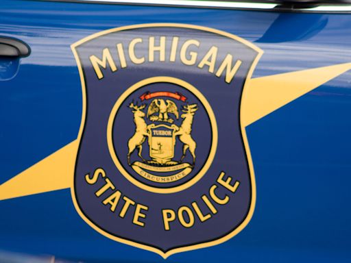 Michigan State Police trooper charged with murder, accused of hitting man with car during chase