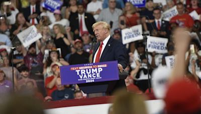 Trump’s 90-minute speech at Atlanta rally splits attacks between Harris, Georgia governor