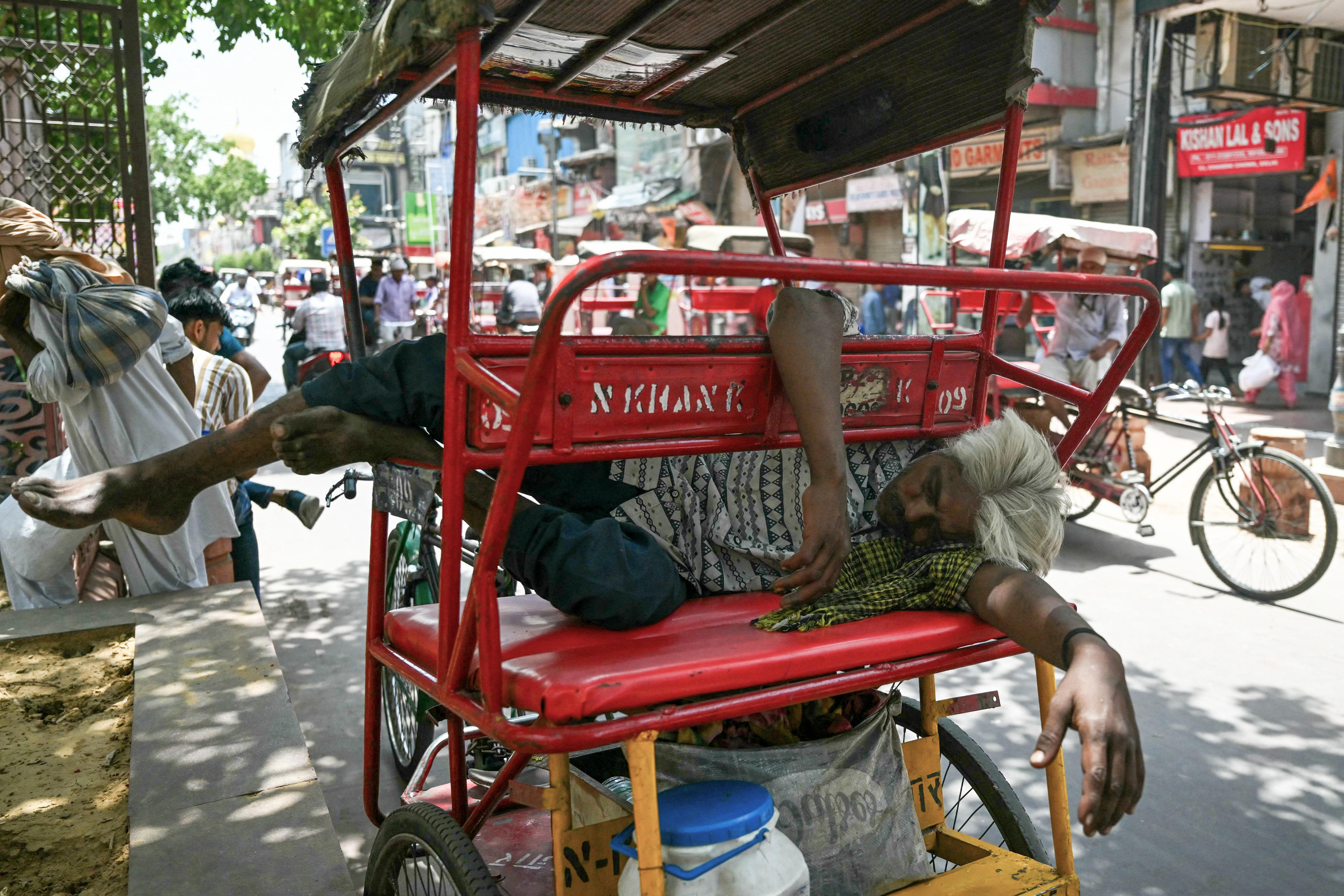 At least 50 people have died in a week as record heat scorches India