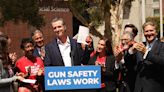 Newsom signs gun law modeled after Texas abortion ban, setting up Supreme Court fight