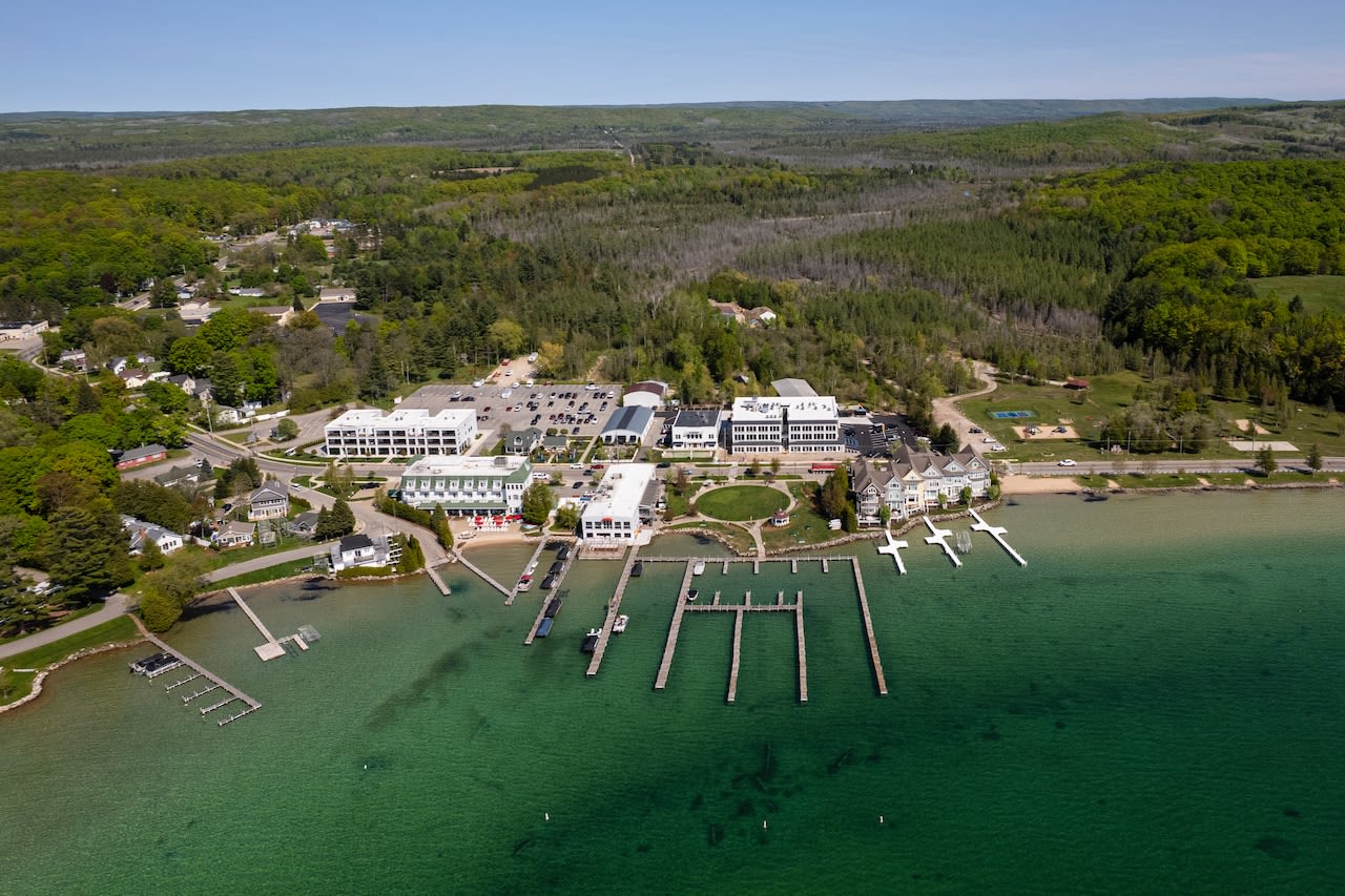 Luxurious condo features high-comfort living with views of picturesque Northern Michigan lake