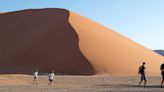 Officials in Namibia criticize tourists who took nude photos atop the Big Daddy dune at national park