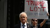 Judge Rules Against Peter Navarro And He Takes It Out On Protester's Sign