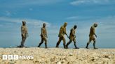 Lowestoft beach welcomes giant sculpture of five walking men