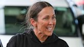 Makeup free Bec Hewitt touches down in Australia with lookalike kids