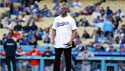 Magic Johnson Gives Fans Fitness Goals While Aboard a Luxury Yacht