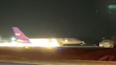 See trail of fire as FedEx plane crash-lands at Tennessee airport without landing gear
