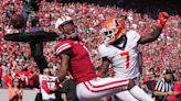 Jim Leonhard sought answers from officials about pass-interference calls in Wisconsin's loss to Illinois