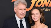 Calista Flockhart's off-the-shoulder top and yellow skirt stun as she supports husband Harrison Ford at premiere of last ever Indiana Jones film