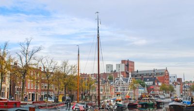 Skip the tourist traps and high prices in Amsterdam — take a short train ride to this beautiful gem instead