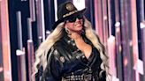 Beyoncé Puts Glamorous Twist on Cowboy Core Fashion in LaPointe... Tie for New ‘Cowboy Carter’ Promo With Kelly ...