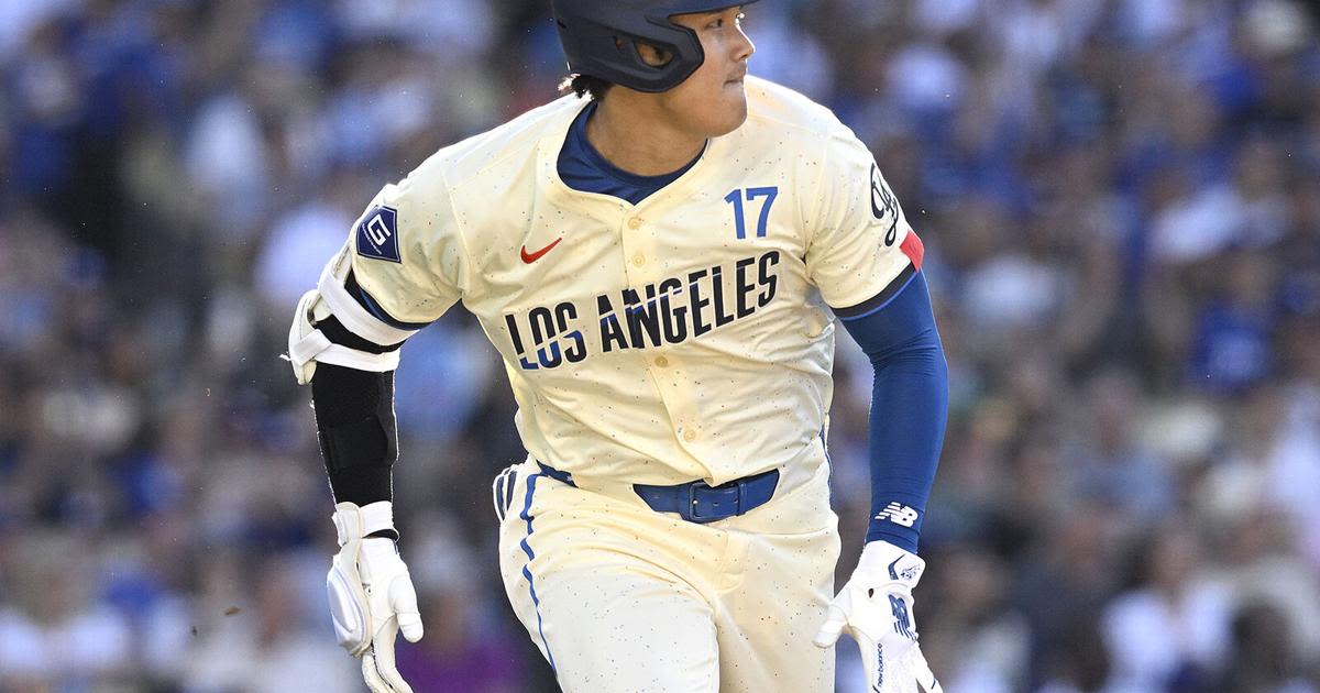 Shohei Ohtani of the Los Angeles Dodgers runs to first on a double in the sixth inning against the Boston Red Sox at Dodger Stadium on July 20, 2024, in Los...