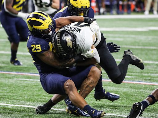 Michigan's Junior Colson reunited with Jim Harbaugh, Chargers in Round 3 of NFL draft
