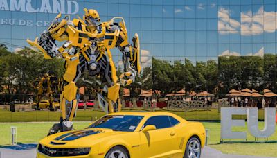 Naked Guy Sits On Top Of Bumblebee Transformer Statue | Real 106.1 | The Insomniac