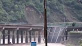 China bridge collapse kills 11 after torrential rains