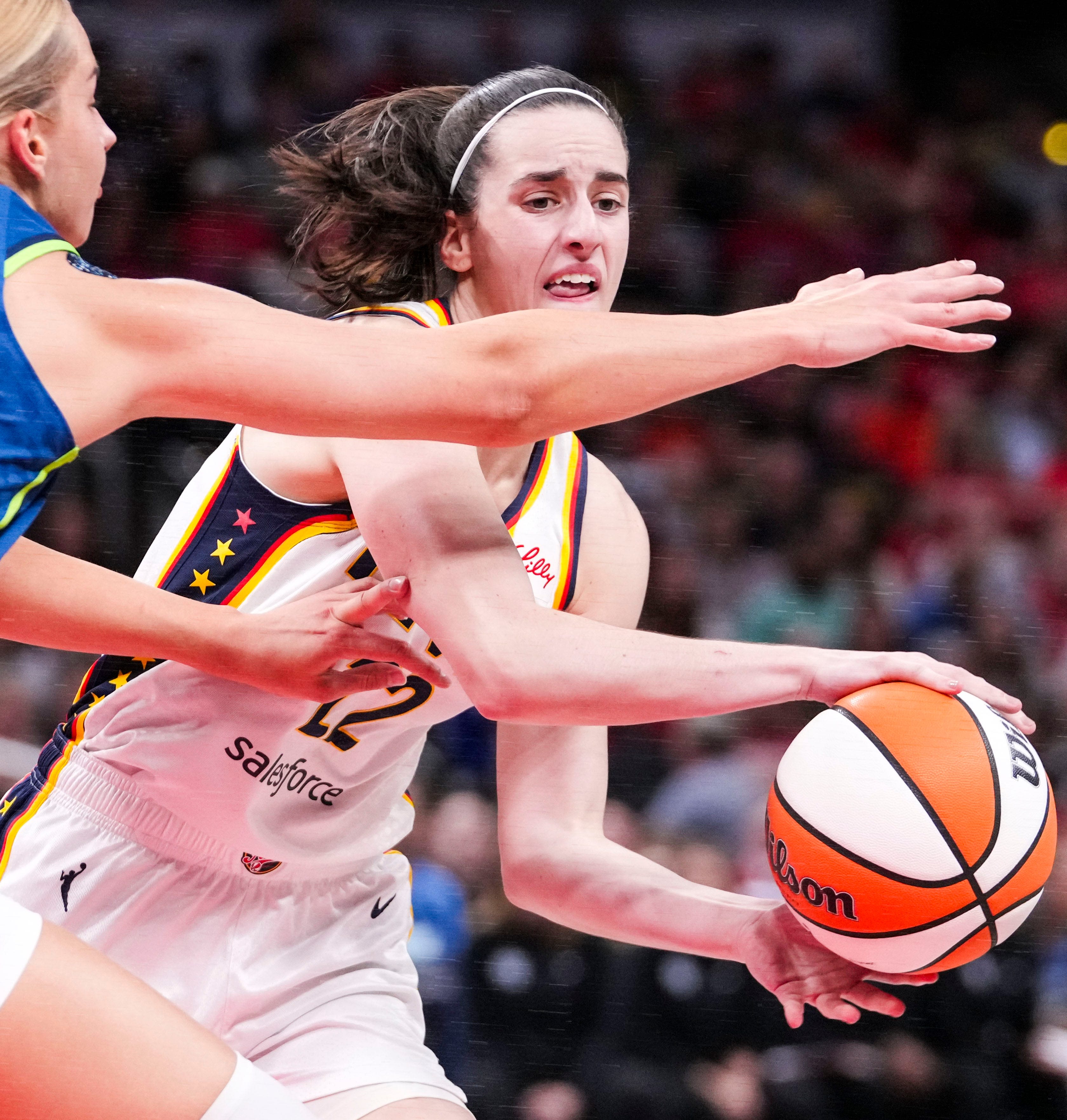 Caitlin Clark of Indiana Fever breaks Alyssa Thomas' WNBA record for assists in a season