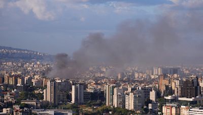 Israel reinforces military presence in Lebanon as Hezbollah reports clashes with troops