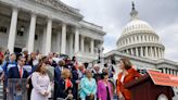House Democrats cheerfully sang 'God Bless America' on the steps of the Capitol as crowds protested the overturning of Roe v. Wade at the Supreme Court across the street