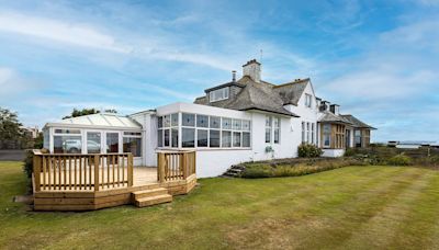 Four-bed coastal home offering a front-row seat of The Open for sale