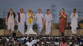 AP PHOTOS: Colorful roadshows and rallies mark India's election season before voting starts Friday