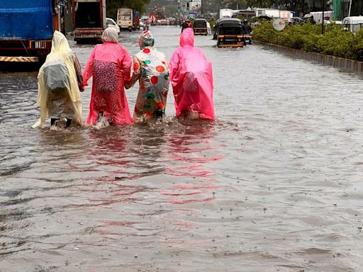 Four dead and flights cancelled as Mumbai gets flooding red alert after heavy rains