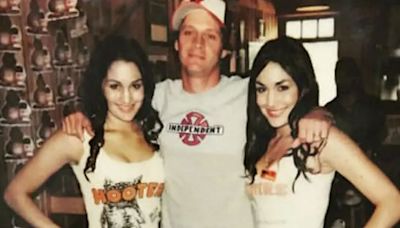 WWE legends Nikki and Brie Bella look almost unrecognizable as Hooters girls