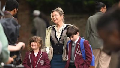 Bridget Jones takes her two kids with Mr Darcy on the school run as Renee Zellweger seen filming