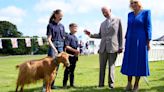 Charles and Camilla present royal title to goats saved from the Nazis on visit to Channel islands