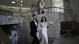 Ukraine war brings nonstop weddings to Kyiv. 'This way, love wins'