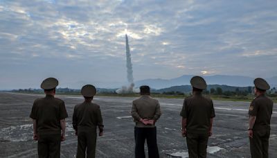 Kim calls for bolstering nuclear and conventional weapons after testing 2 types of missiles