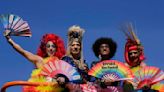 Gay pride revelers in Sao Paulo reclaim Brazil's national symbols