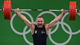 Olympic weightlifter killed "defending Ukraine" from Russia, coach says