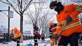 Snow blankets northern China, closing roads and schools and suspending train service