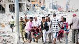 Two explosions rock Somalia's capital, killing at least 30