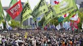 Workers, activists across Asia and Europe hold May Day rallies to call for greater labor rights