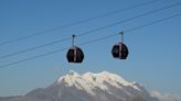 Mother-of-two dies in freak accident in front of family after clothes snag on cable car over Italian valley