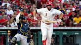 Cincinnati Reds cut Mike Moustakas after Curt Casali returns on a one-year contract