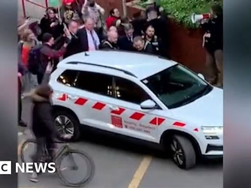 Cardiff Uni: Jacob Rees-Mogg chased by protesters after talk