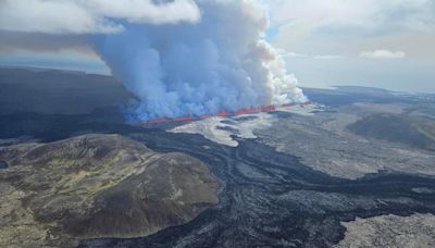 Watch Live: "Explosive" Iceland volcano eruption shoots lava across roads and sends pollution toward the capital