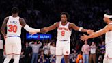 ...Anunoby of the New York Knicks celebrates with Julius Randle and Josh Hart against the Minnesota Timberwolves in the second half at Madison Square...