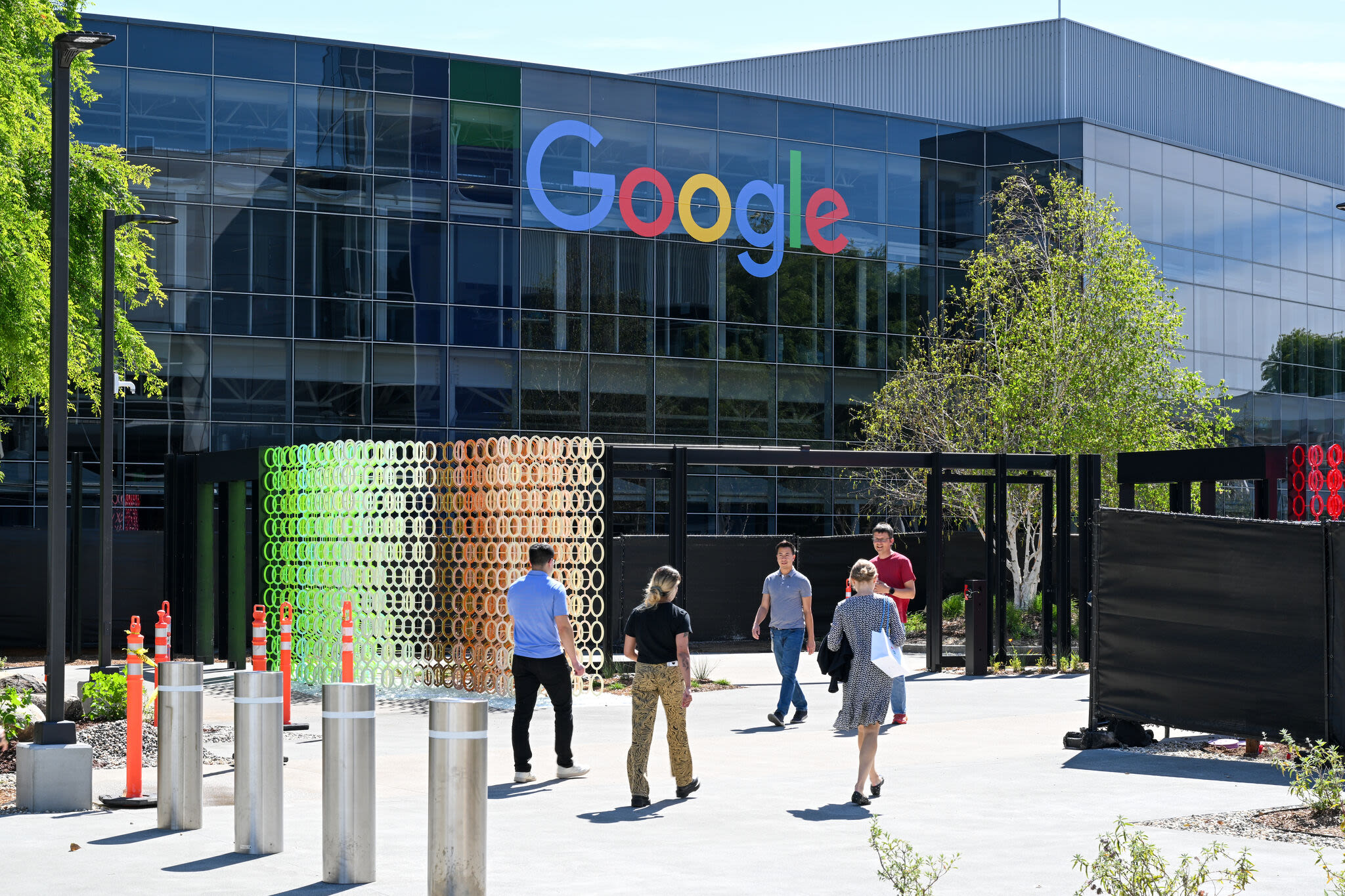 Google lays off dozens in Bay Area on way to record valuation
