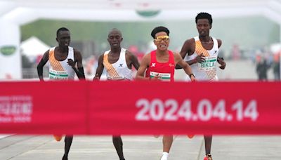 Chinese runner’s win revoked after probe into Beijing Half Marathon