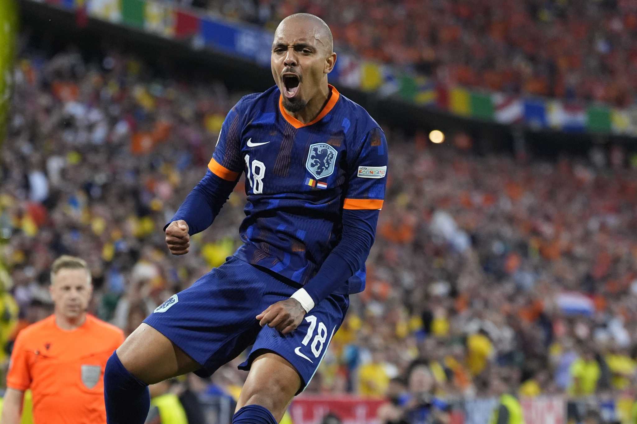 Much-improved Netherlands beats Romania 3-0 to reach first Euros quarterfinal in 16 years