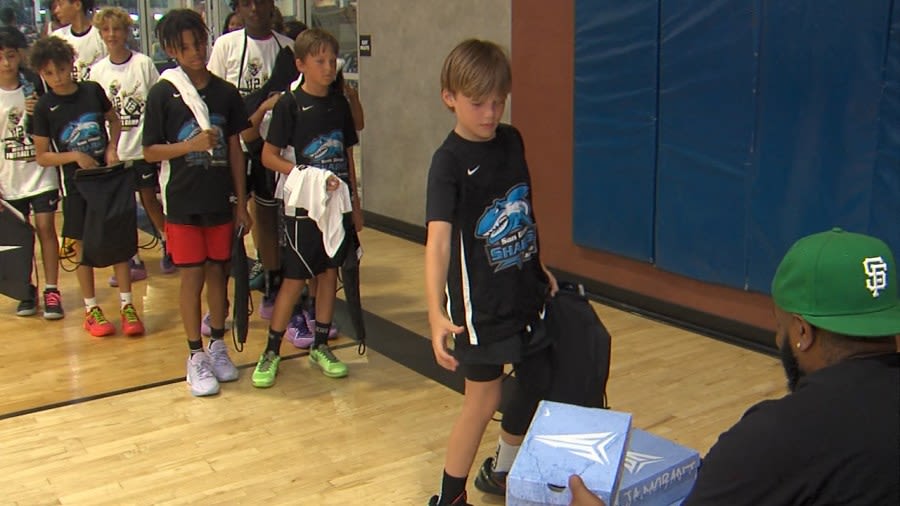 NFL New Orleans Saints Star Wide Receiver Chris Olave surprises youth basketball team