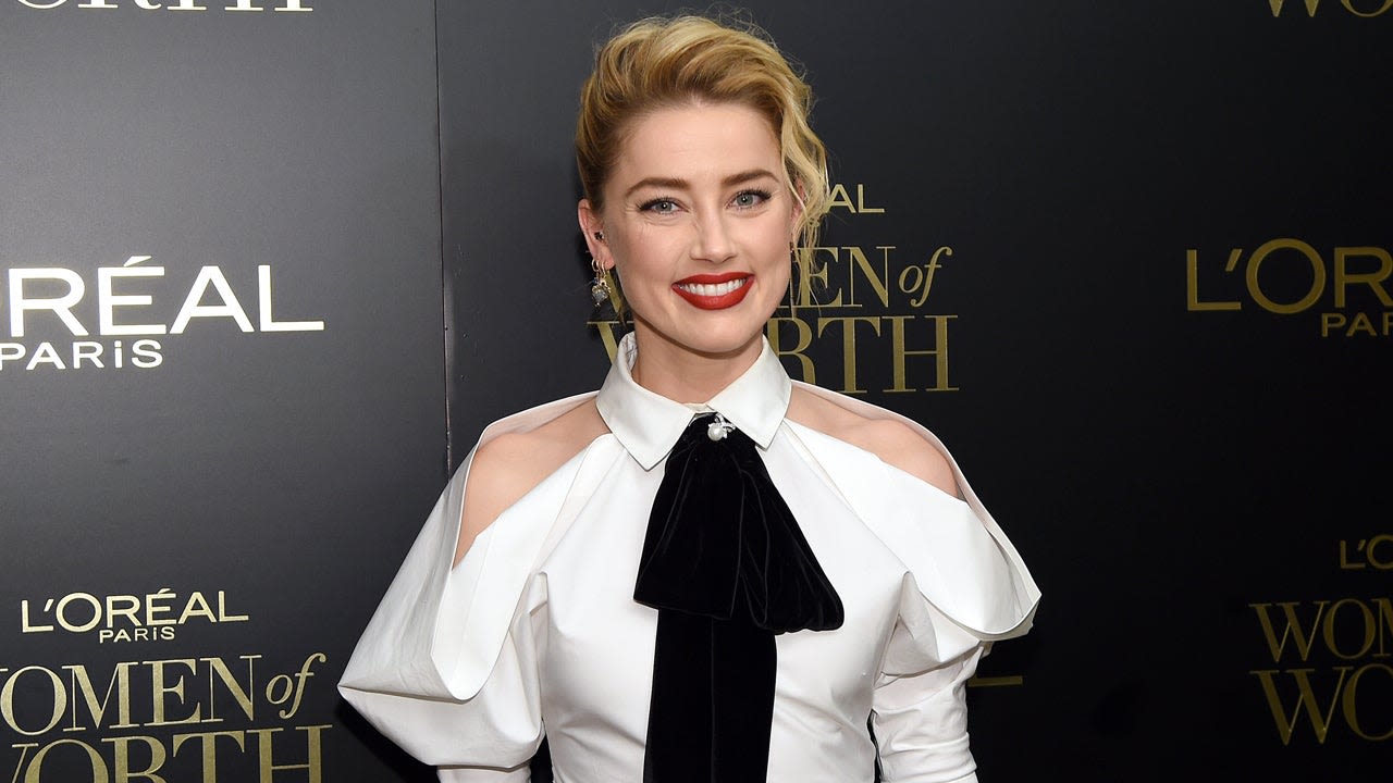 Amber Heard Drinks Champagne in Rare Photo for 38th Birthday