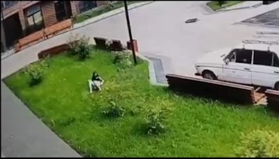 Video: Russian woman falls from 13th floor on soft grass, walks away with minor injuries