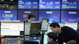 Asian shares shaky as investors wary before US inflation data