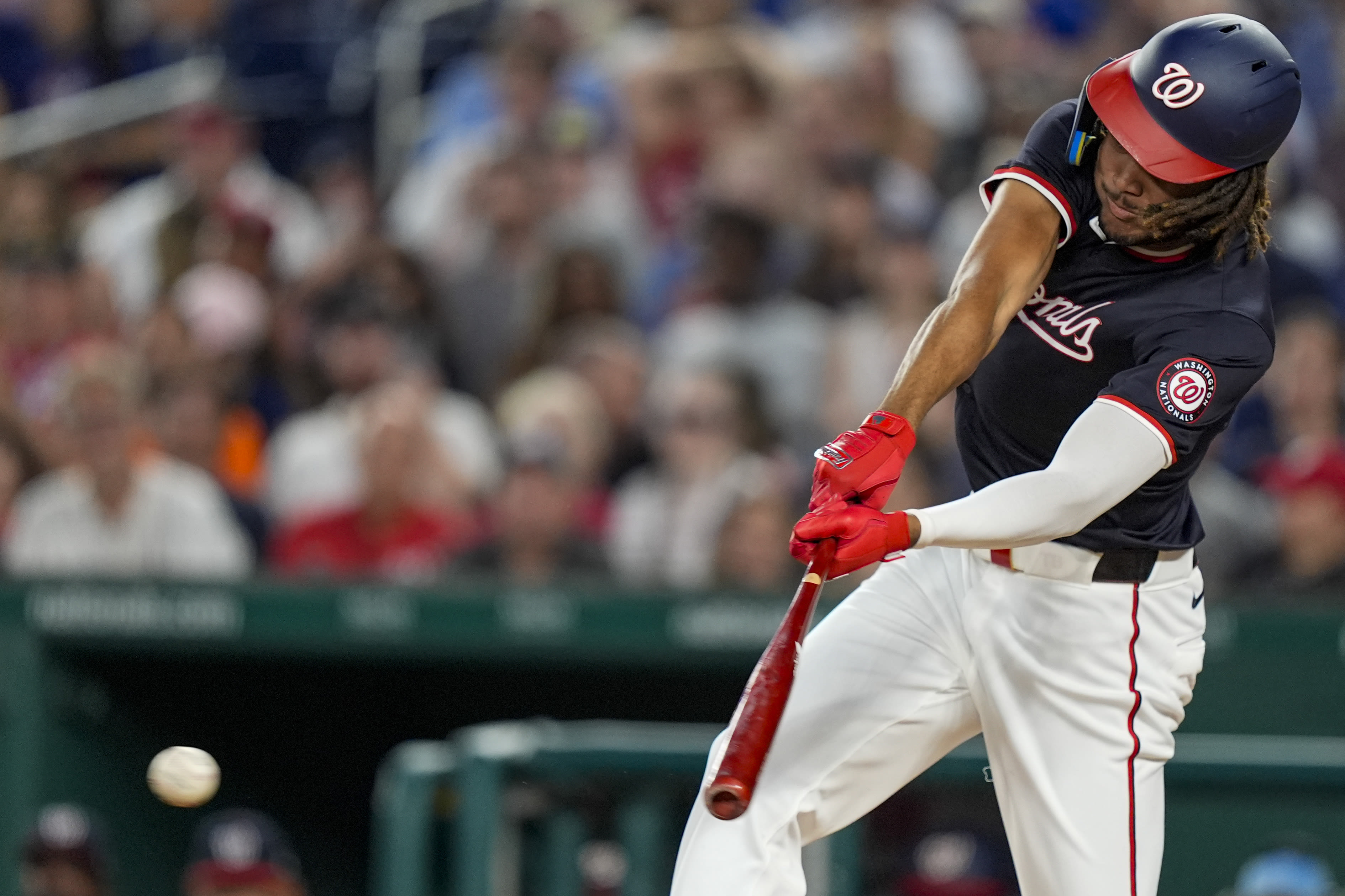 Wood drives in go-ahead run, Garcia homers twice in the Nationals' 7-5 victory over the Mets