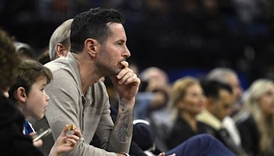 The Lakers are hiring JJ Redick as their new head coach, an AP source says