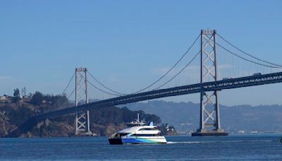 Driver fleeing car collision on Bay Bridge jumps off railing, and survives